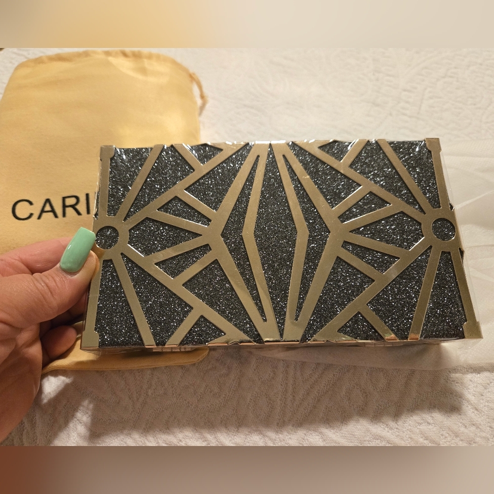 Chic Black and Gold Geometric Clutch